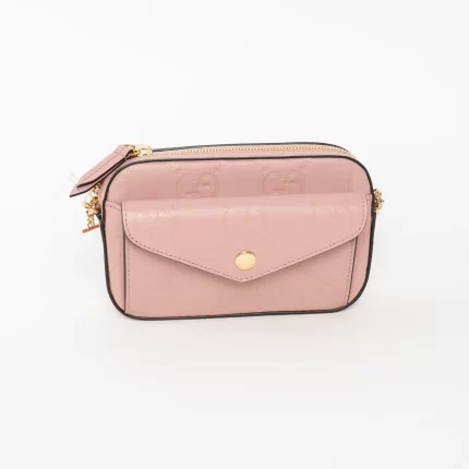 Mauve GG Embossed Leather Mini Messenger Bag